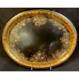 A 19th century tole ware oval tray, 36.5cm wide