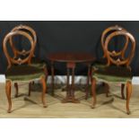 A set of four Victorian walnut balloon back dining chairs, 91cm high, 47cm wide, the seat 35cm deep;