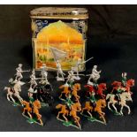 A collection of small scale painted flat lead figures on horseback, various poses, probably by a