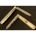 An Edwardian silver and mother of pearl folding pocket fruit knife, Sheffield 1907; another,
