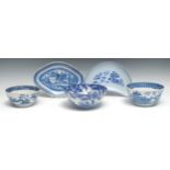 A Chinese rounded navette-shaped dish, painted with a stylized landscape in underglaze blue,