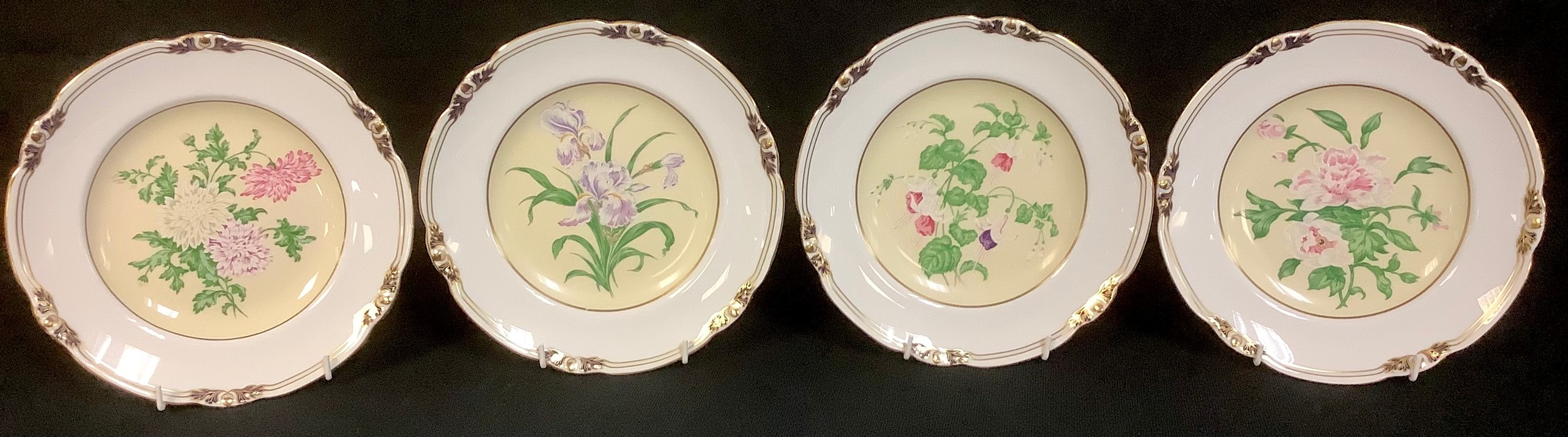 A set of four Royal Crown Derby prototype shaped circular cabinet plates, Flowers For An Indian