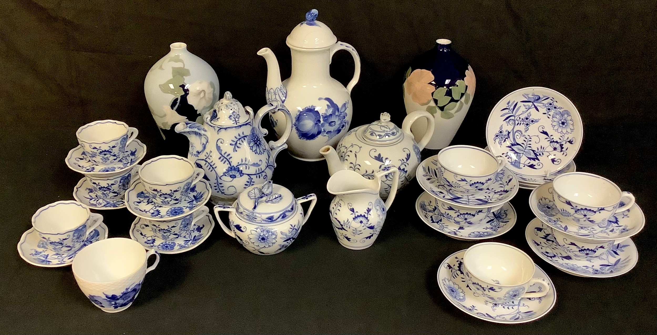 Continental Ceramics - a German porcelain blue and white part tea service, in the manner of Meissen;