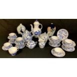 Continental Ceramics - a German porcelain blue and white part tea service, in the manner of Meissen;