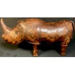 A large stitched leather rhinoceros, in the manner of Liberty, 80cm x 33cm