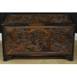 A Chinese inspired carved hardwood camphor wood lined blanket chest, 51.5cm high, 91.5cm wide