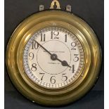 An brass porthole master clock, Oldfield's Ltd, Earth Controlled System, c.1930, 27cm diameter