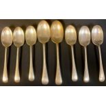 A set of six silver dessert spoons, Sheffield 1960; a pair of silver serving spoons, Sheffield 1960,