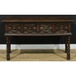 A Charles II design oak low dresser, oversailing rectangular top above a pair of frieze drawers, the