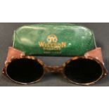 A pair of American Willson faux tortoiseshell and brown leather sunglasses "goggles", original green