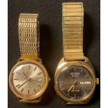 A Sekonda day/date wristwatch; another, Timex