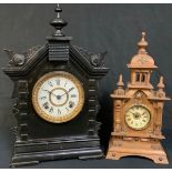A 19th century German oak architectural mantel clock, 37.5cm high; another, American, Ansonia