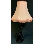 An Italian Art Deco style ceramic table lamp modelled as a female nude, 63cm high over fittings