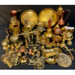 Brassware - a pair of cast brass candlesticks modelled as cobra; an 18th century chamberstick; an