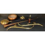 A pair of brass horse ames, 83cm; a copper and brass warming pan; a copper hunting horn; a copper