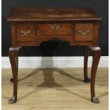 A George II style lowboy or side table, rectangular top with moulded edge and reentrant angles,