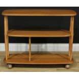 A retro mid-20th century Ercol trolley bookcase, 71cm high, 91.5cm wide, 31.5cm deep