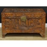 A Chinese inspired carved hardwood camphor wood lined blanket chest, hinged cover enclosing a