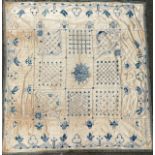 A 20th century silk bed throw, embroidered in tones of blue with birds and stylised flowers, 190cm