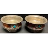 A pair of Indian metal mounted treen bowls, 11cm diameter, 6.5cm high