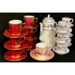 An early 20th century Royal Worcester coffee service for six comprising coffee pot, coffee cans