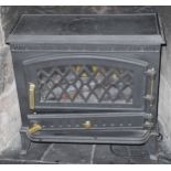 An electric 'log burner' heater **This lot is located at Cressbrook Hall, SK17 8SY; Collection is