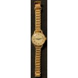 A lady's 9ct gold Buren Grand Prix wristwatch, Arabic numerals, integral 9ct gold bracelet strap,
