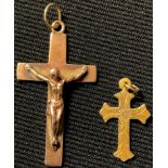 A 9ct gold cross, with corpus Christie; another, 9.2g