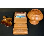 A carved treen playing card box, decorated with leafy cartouches, 14cm wide, 8.5cm high, 13cm