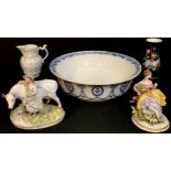 A Staffordshire group, o a cow and a milkmaid, c.1860; a French porcelain jug, decorated with