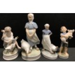 A Royal Copenhagen figure, Goose Girl, number 527, 24cm, printed marks; others, smaller Goose