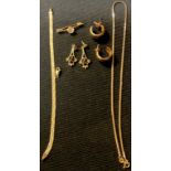 A 9ct gold mounted bar brooch set with a paste solitaire, 1.7g gross; a 9ct gold bracelet, 2.5g; a