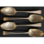 A set of three George III silver table spoons, London 1800; an Irish silver table spoon, Dublin 1794