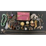 Jewellery - a jadeite bracelet; costume brooches; earrings; etc