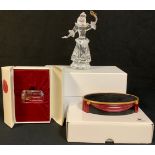 A Swarovski SCS 2000 Masquerade Columbine figurine, boxed with stand and plaque, each boxed (3)