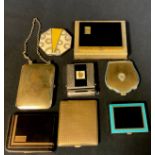 An Art Deco combination compact with miniature timepiece; other 1930's and later compacts (8)