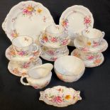 A Royal Crown Derby Posie pattern tea set, comprising six cups, saucers and tea plates, milk and