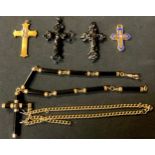 A Victorian jet cross; a gilt metal cross; a onyx and gilt metal cross on chain; etc