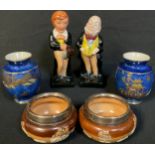 A pair of Royal Doulton salt glazed salts, silver rims, Chester 1920; a pair of Royal Doulton