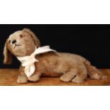 A 1930?s brown and cream mohair Dog, straw filled head with brown and black glass eyes, black