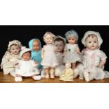 A collection of 20th century dolls, comprising a Roddy hard plastic walking doll, 36cm high; a