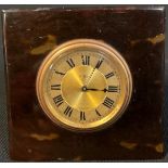 A early 20th century tortoiseshell easel strut dressing table clock, eight-day movement, c.1930