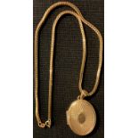 A 9ct gold locket and chain, 22.7g gross