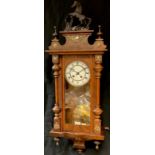 A Victorian walnut Vienna wall clock, 60cm high