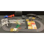 A Matchbox Powertrack toy car racing set, cars, controllers, track, accessories, instructions