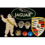 Automobilia - AA badges; Jaguar, Michelin and Porsche cast iron advertising signs; Austin petrol