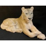 A Royal Copenhagen model of a resting lioness, number 804, 31cm wide, printed and painted marks