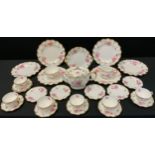 An Extensive Royal Crown Derby Pinxton Roses pattern six setting dinner and tea service ins large