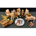 A resin Boxer; a Danbury Mint Boxer plate; other dog and cat models; etc