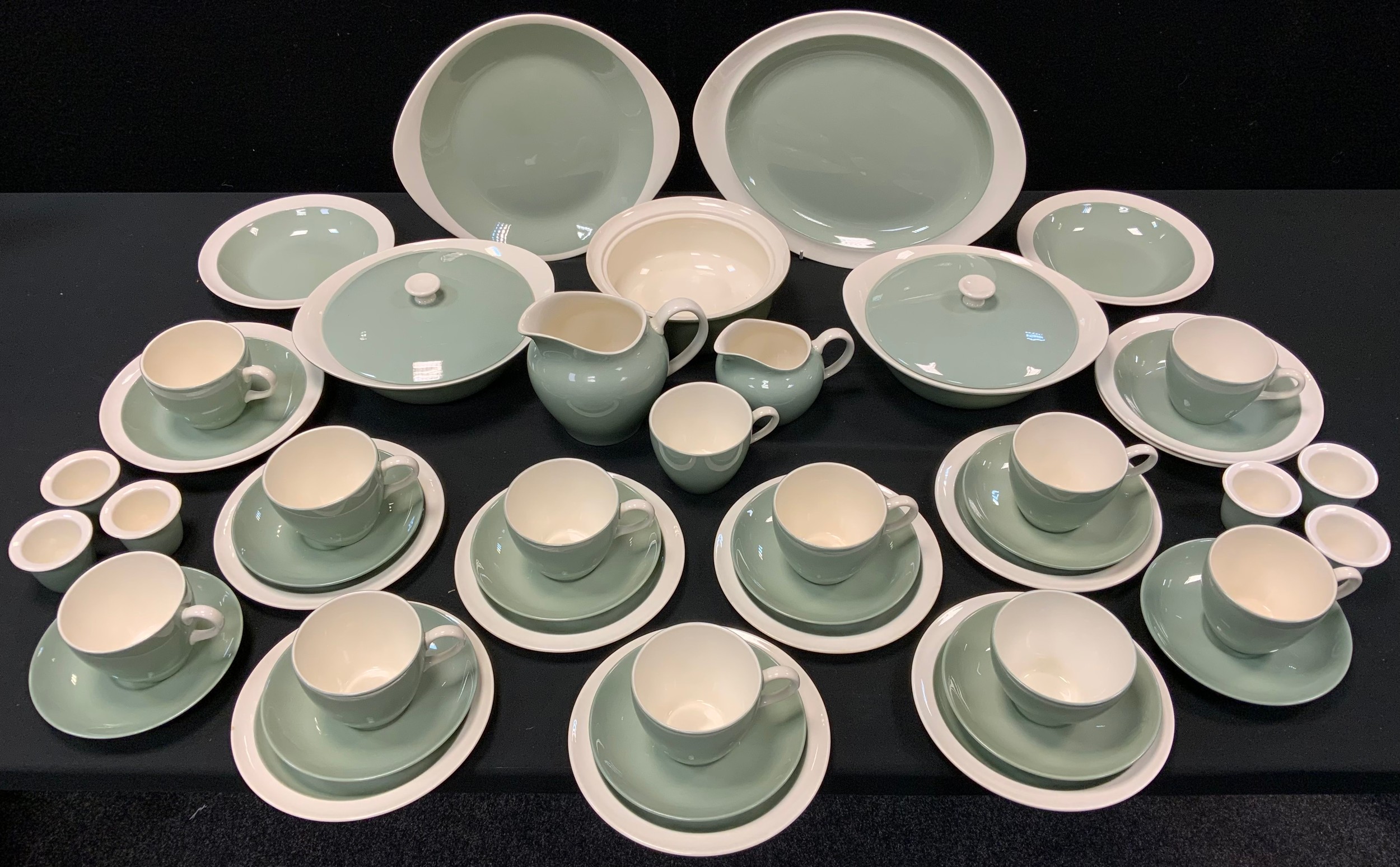 A Wedgwood olive green dinner service, printed marks